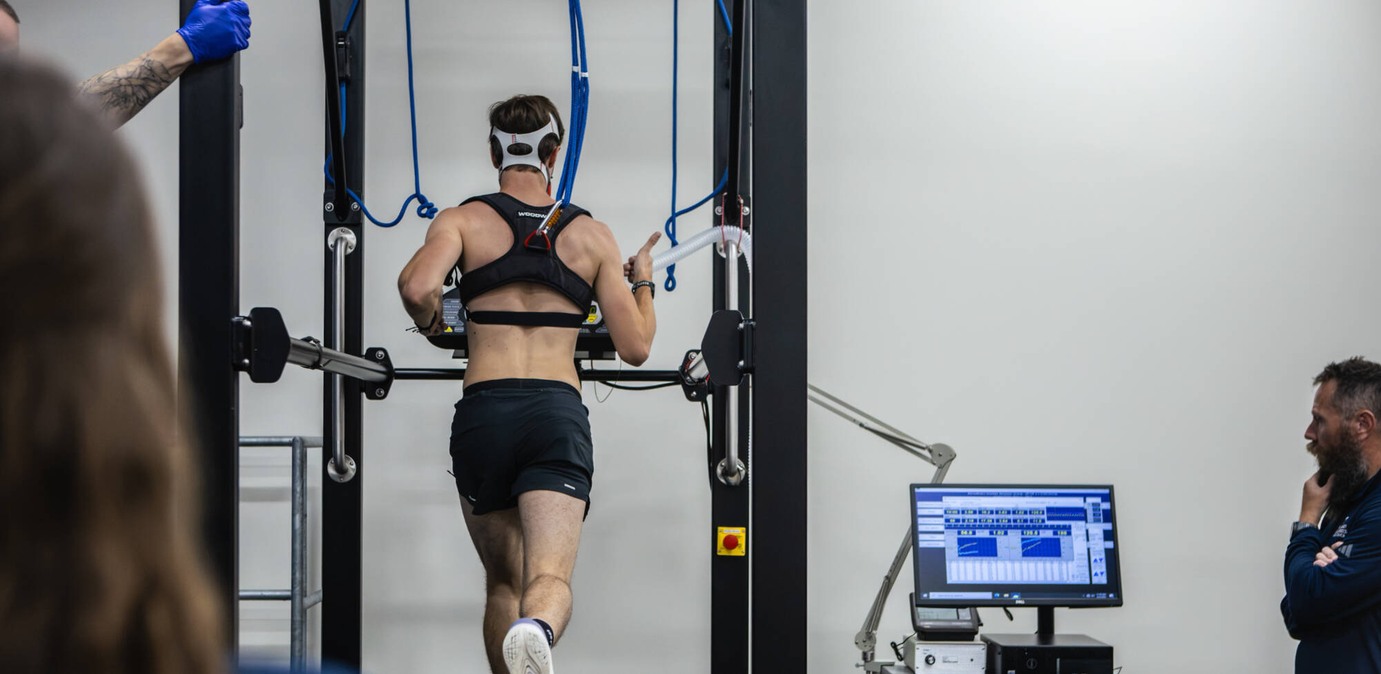 Client running on treadmill for VO2max test